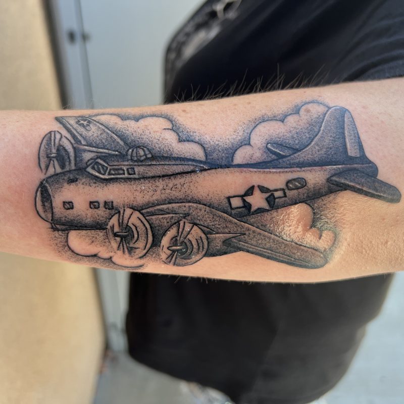 Bomber plane tattoo by Chunkytattoos