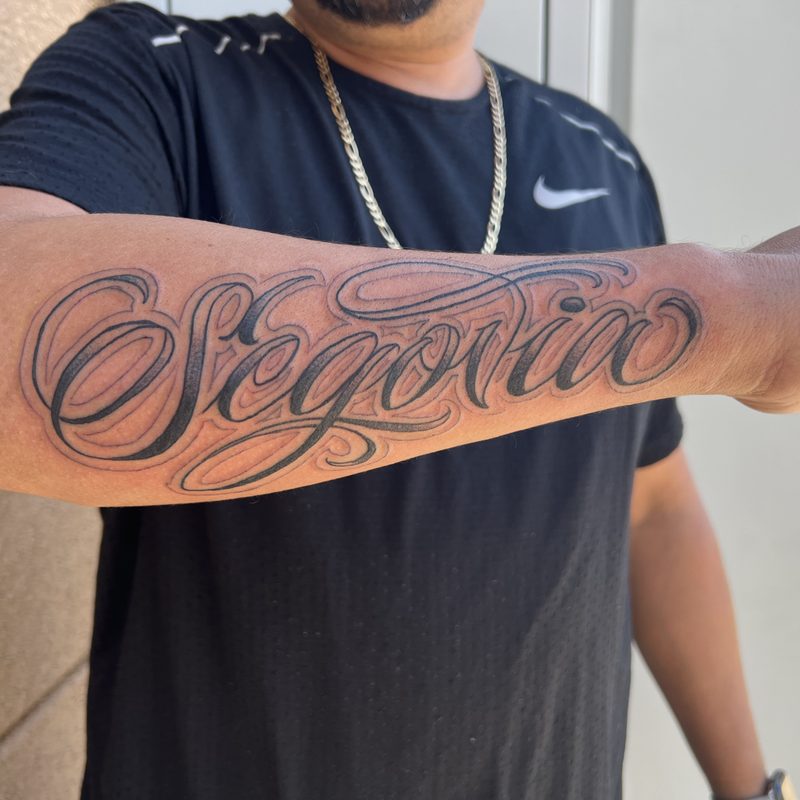 Script lettering tattoo by Chunkytattoos