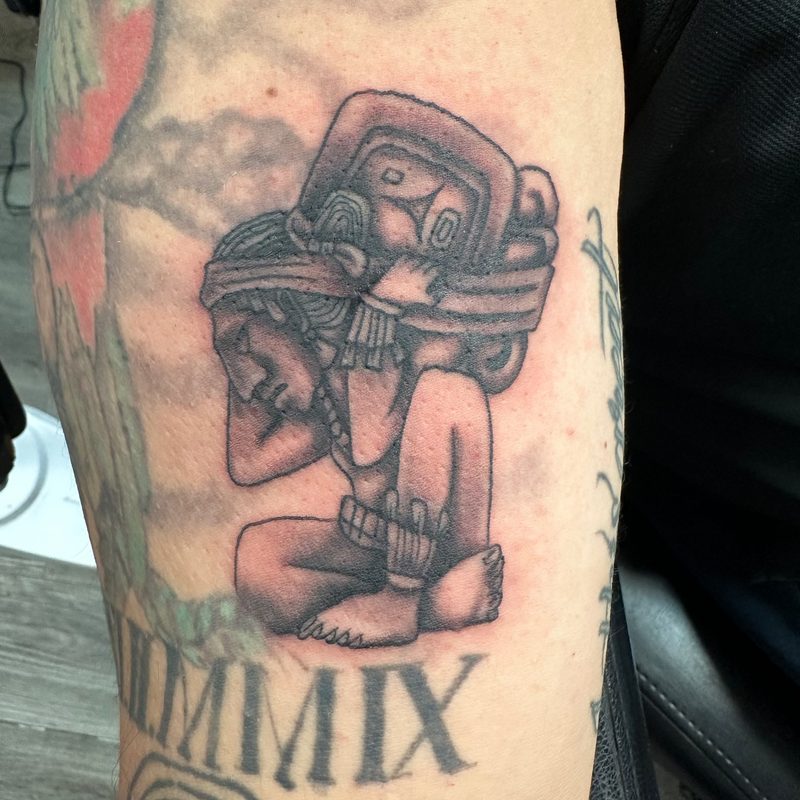 Aztec figure tattoo by Chunkytattoos