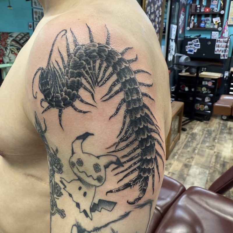 Centipede tattoo by Morewicked