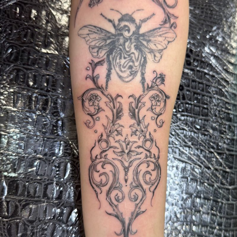 Bee and filigree tattoo by Morewicked