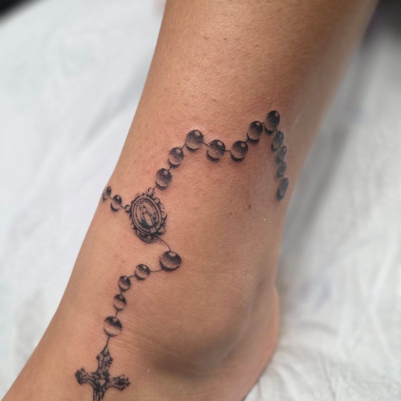Rosary tattoo by Tediyama